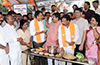 Mangaluru: BJP workers celebrate Assembly election results with crackers, sweets